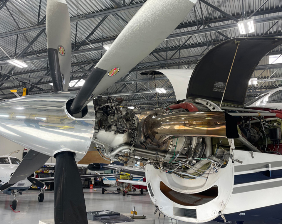 Turboprop engine with the cowling open in the Qmulus hangar